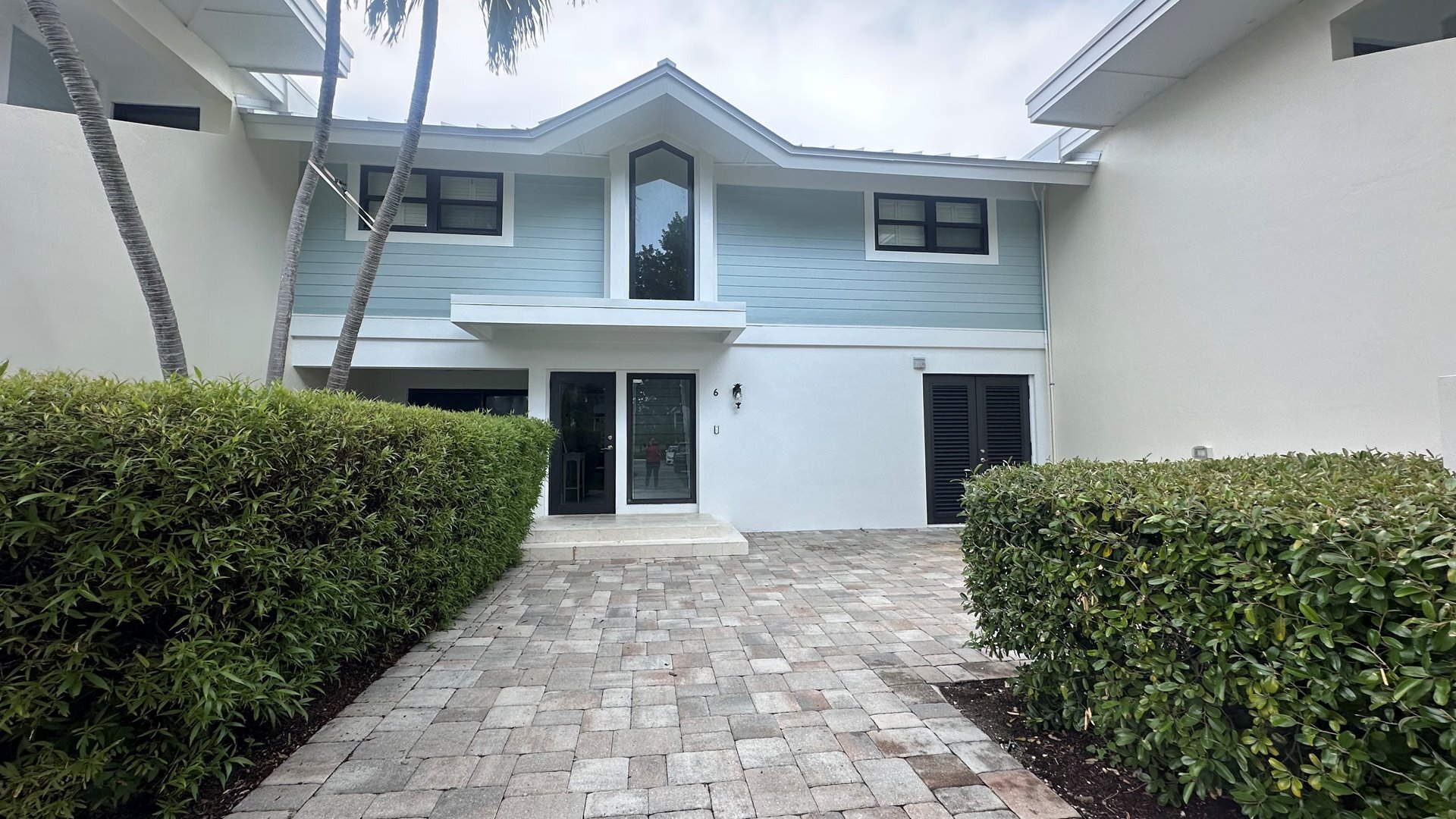 A welcoming façade that sets the tone for your relaxing getaway.